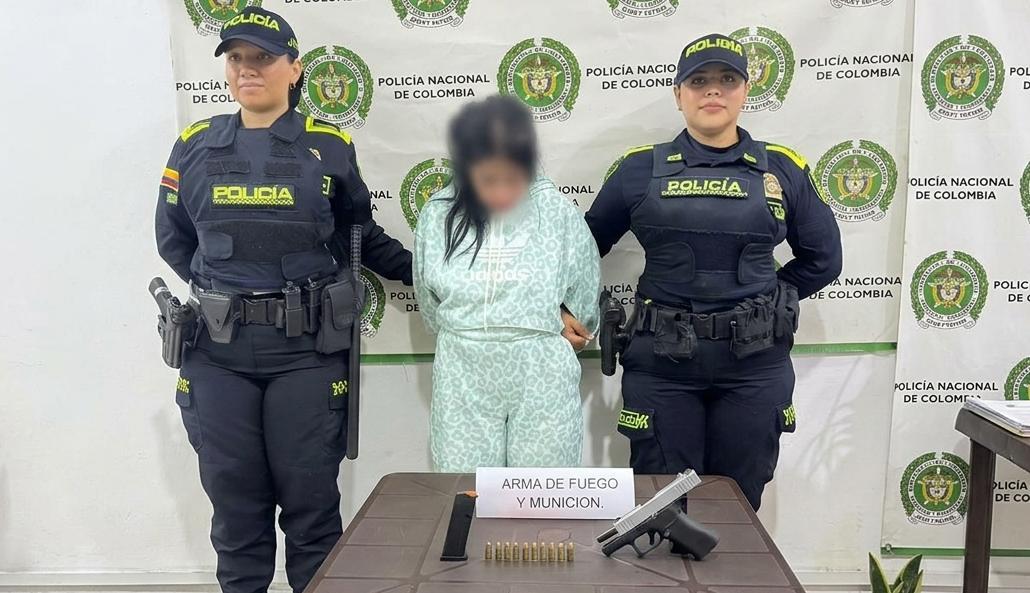 Capturada con arma